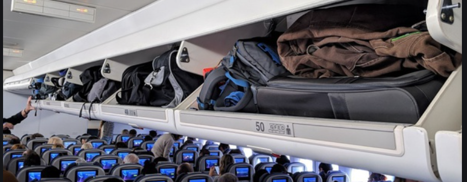Attenzione! Carry-On Baggage May Shift During Takeoff and Landing